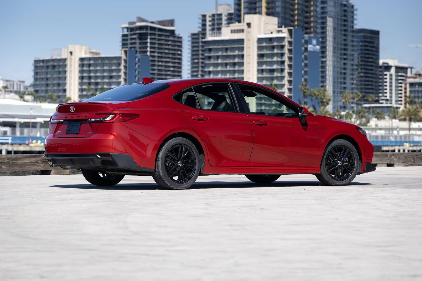 A red car sitting parked.