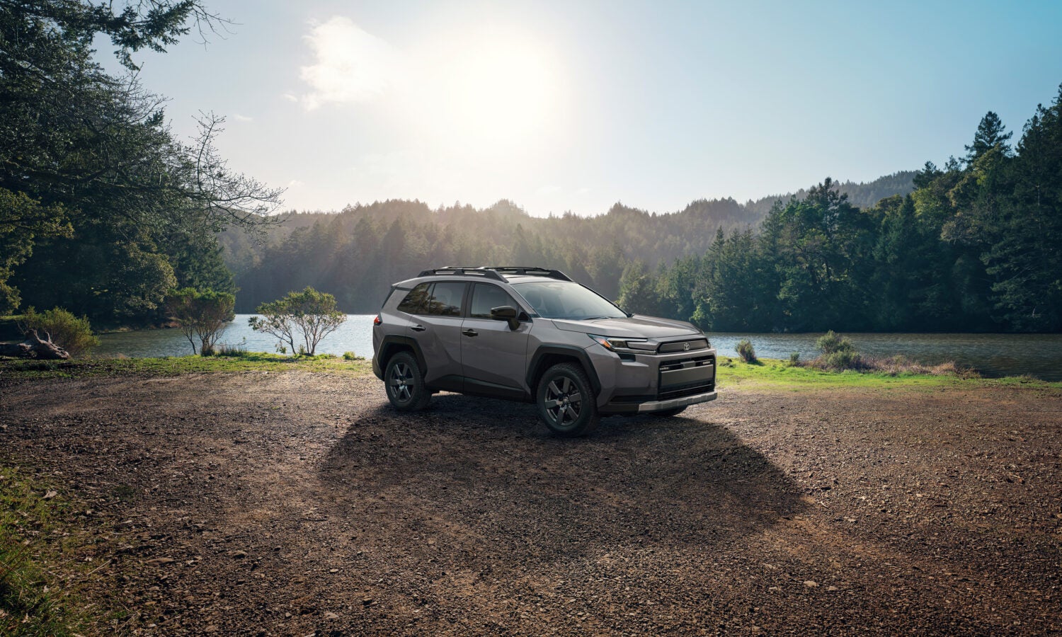 Two suv driving on the road.