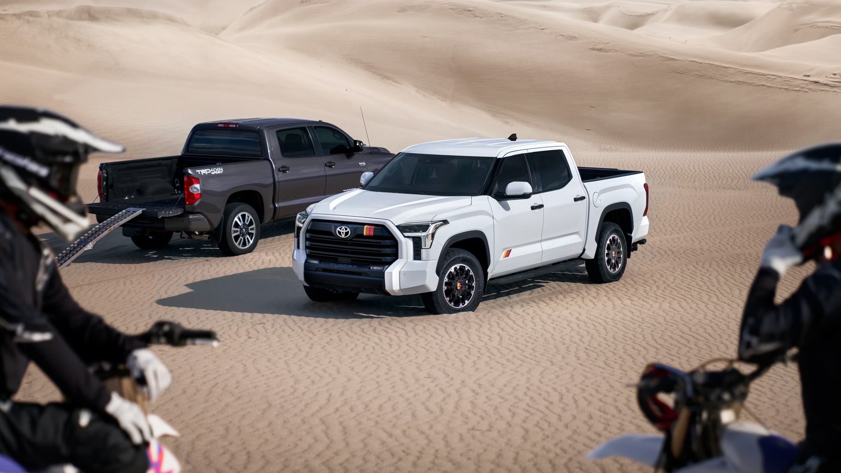 Two truck sitting parked.
